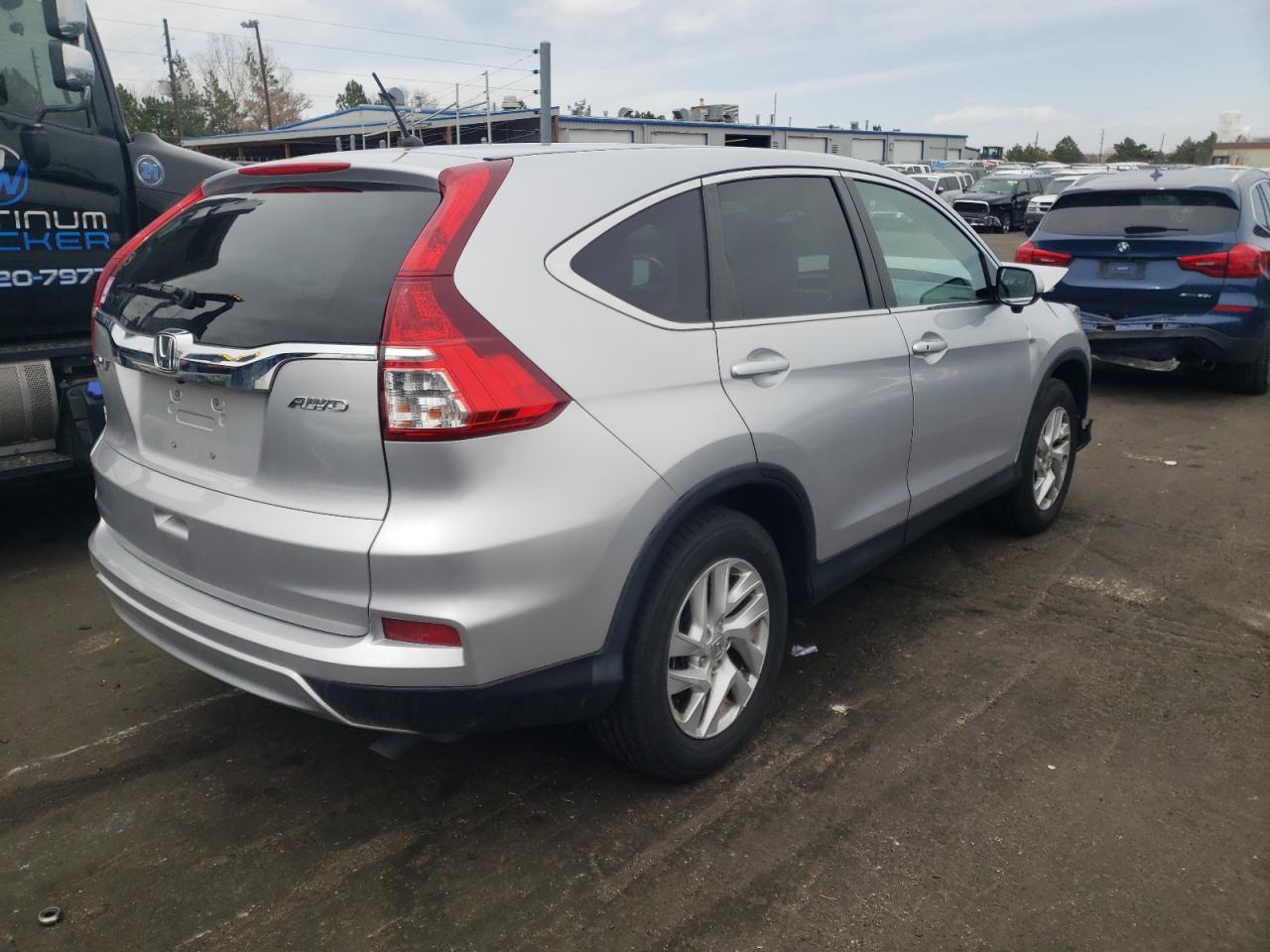 Photo 4 from auction – 2015 HONDA CR-V EX with VIN 2HKRM4H59FH614303