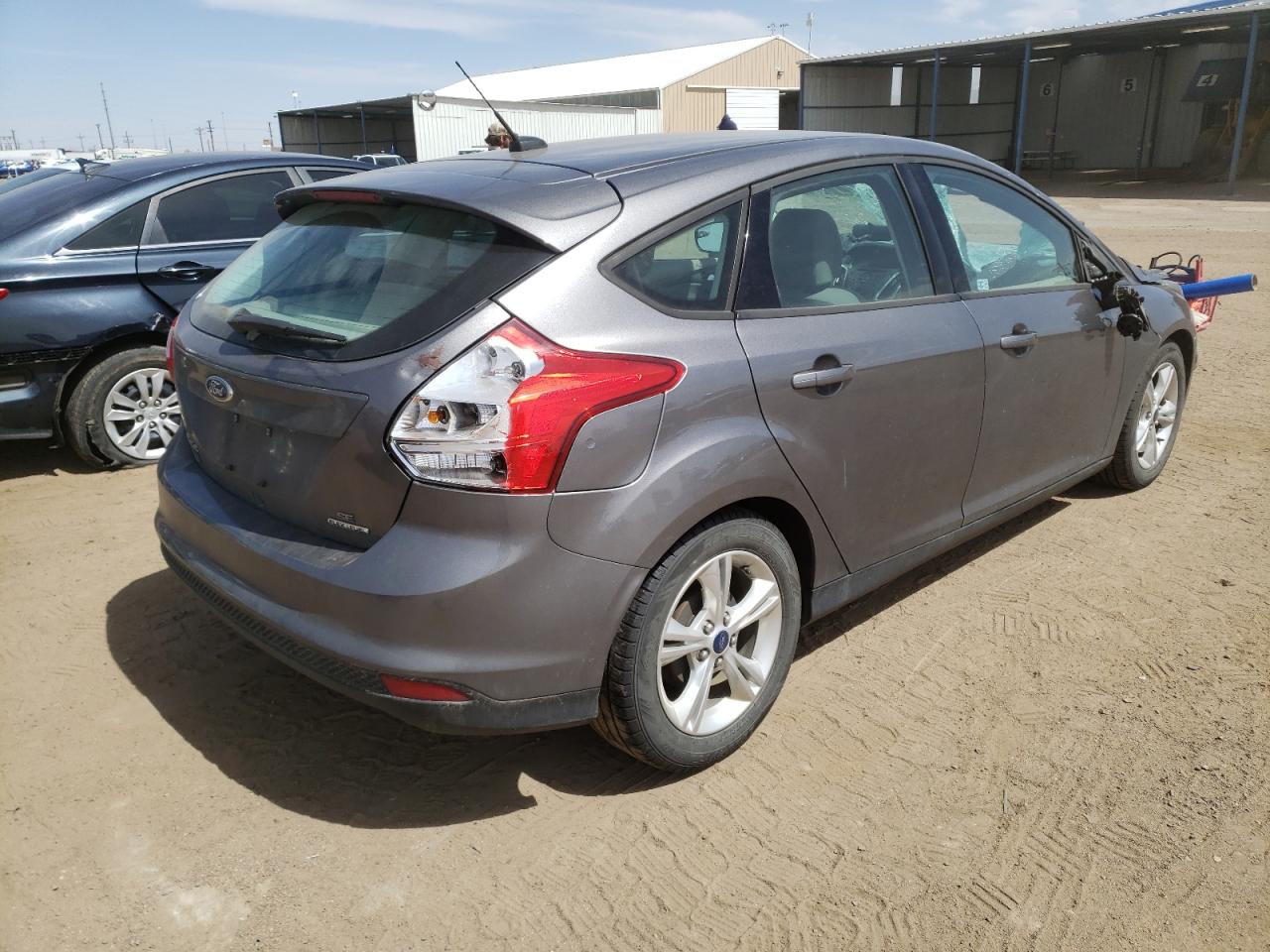 Photo 4 from auction – 2014 FORD FOCUS SE with VIN 1FADP3K22EL299872