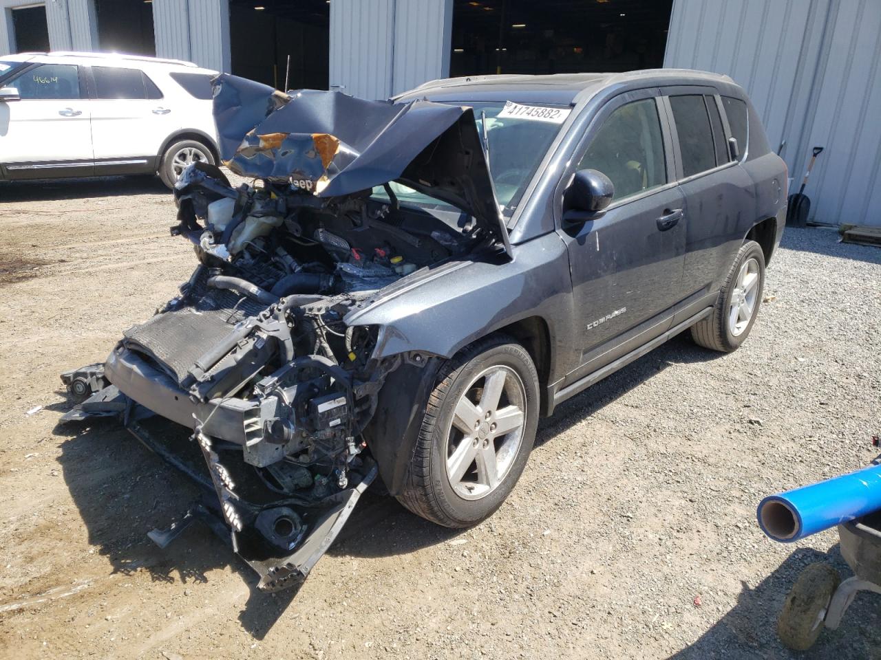 Photo 2 from auction – 2014 JEEP COMPASS LA with VIN 1C4NJCEA9ED752818
