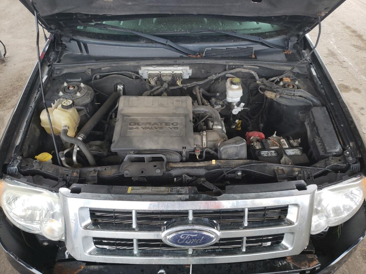 Photo 7 from auction – 2009 FORD ESCAPE LIM with VIN 1FMCU94G69KA08517