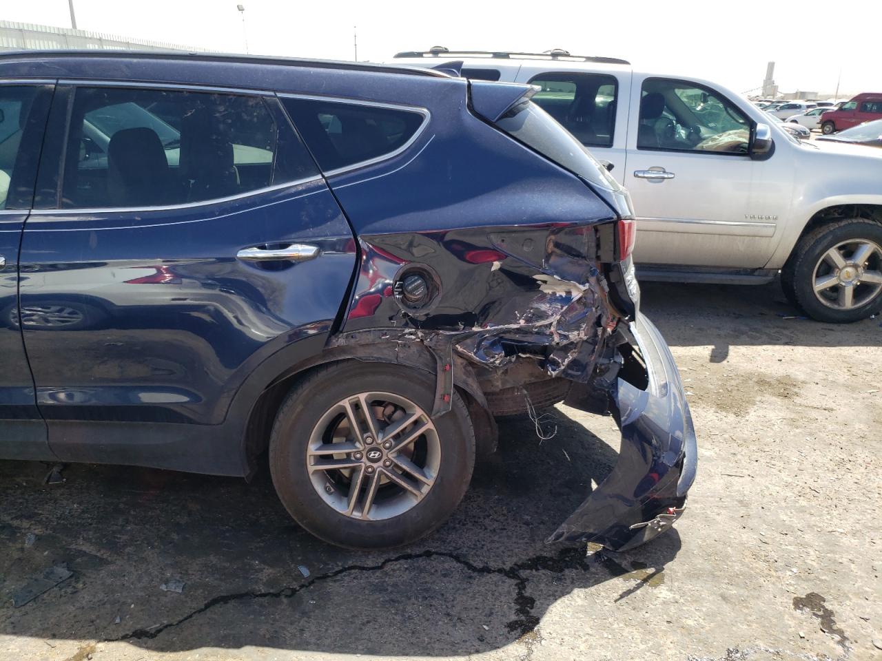 Photo 9 from auction – 2017 HYUNDAI SANTA FE S with VIN 5XYZU3LBXHG463554