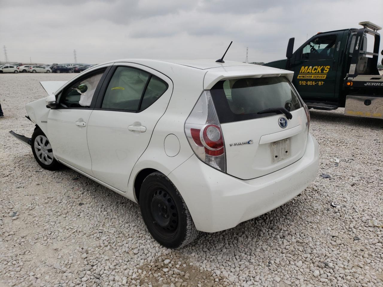 Photo 3 from auction – 2014 TOYOTA PRIUS C with VIN JTDKDTB34E1062265