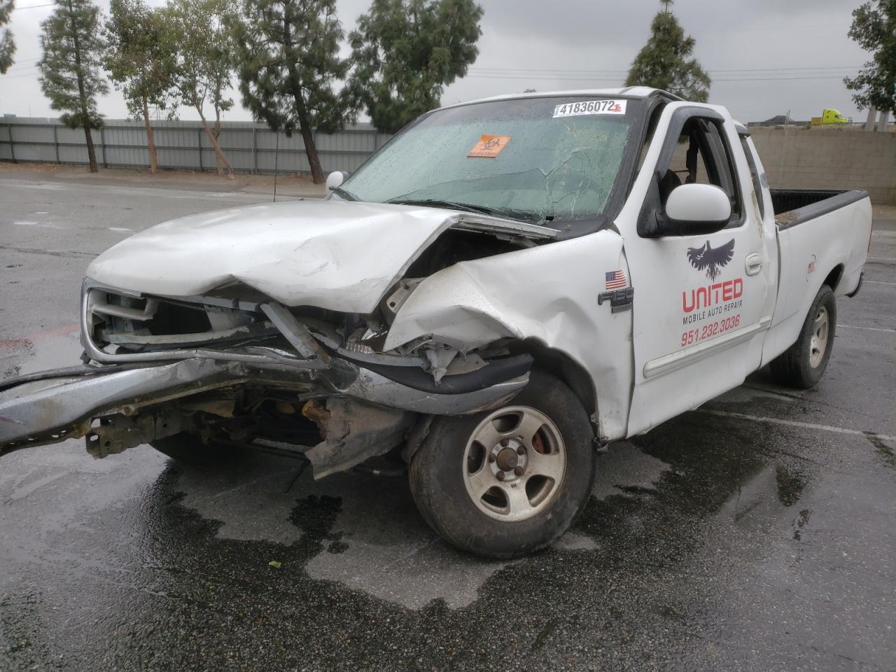 Photo 2 from auction – 2000 FORD F150 with VIN 1FTRX17L4YKA93968