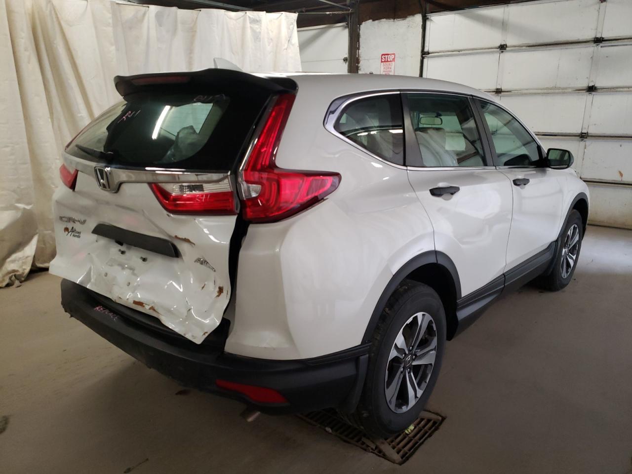 Photo 4 from auction – 2019 HONDA CR-V with VIN 2HKRW6H38KH204686