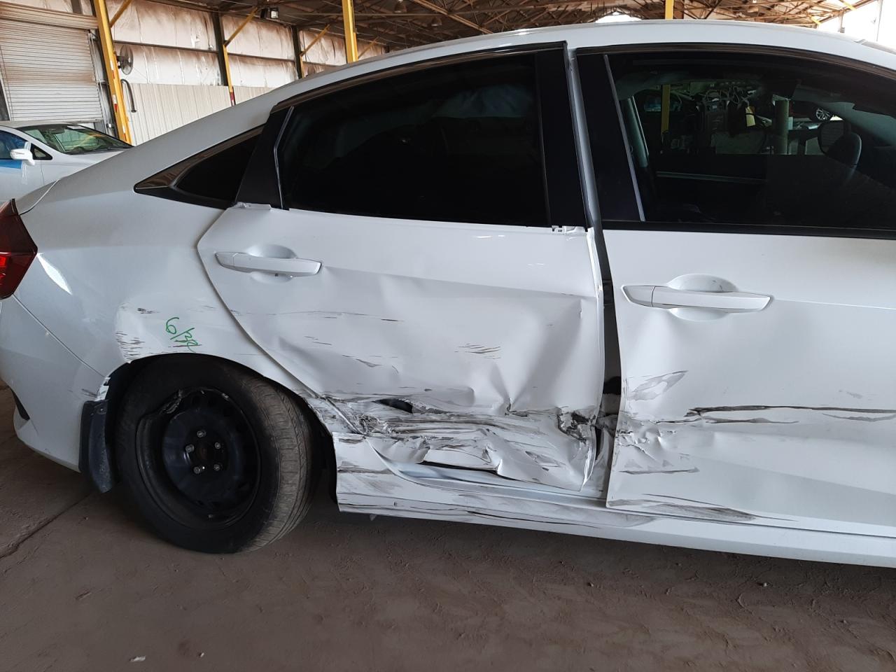 Photo 9 from auction – 2019 HONDA CIVIC LX with VIN 19XFC2F60KE006254