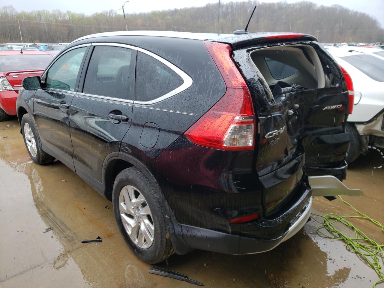 Photo 3 from auction – 2015 HONDA CR-V EXL with VIN 5J6RM4H72FL020644