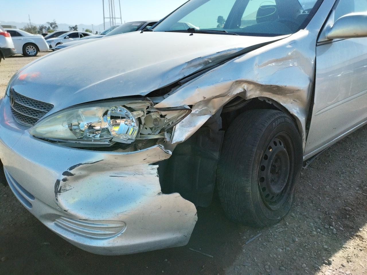 Photo 9 from auction – 2004 TOYOTA CAMRY LE with VIN 4T1BE32K24U891977