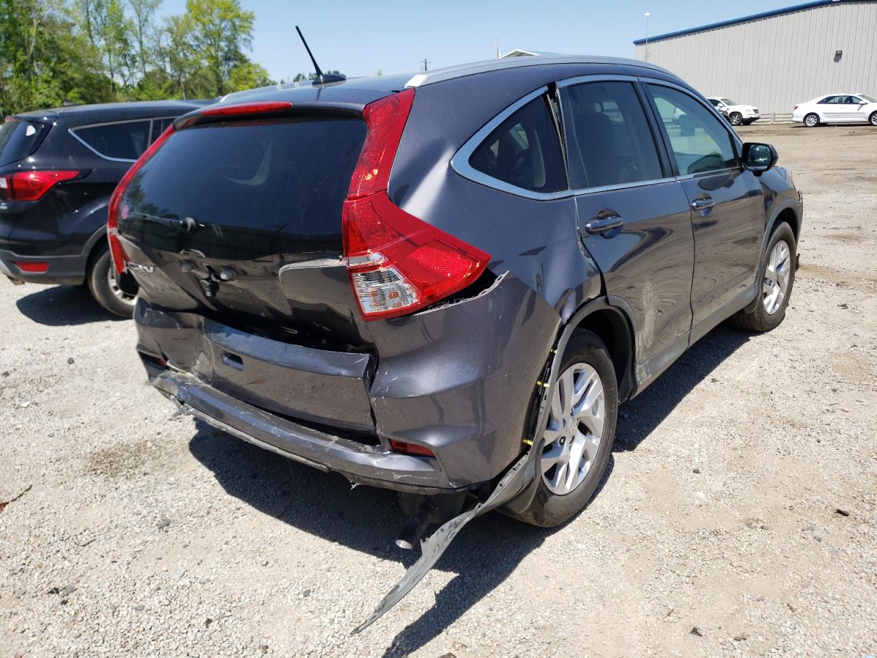 Photo 4 from auction – 2016 HONDA CR-V EXL with VIN 2HKRM3H73GH538736