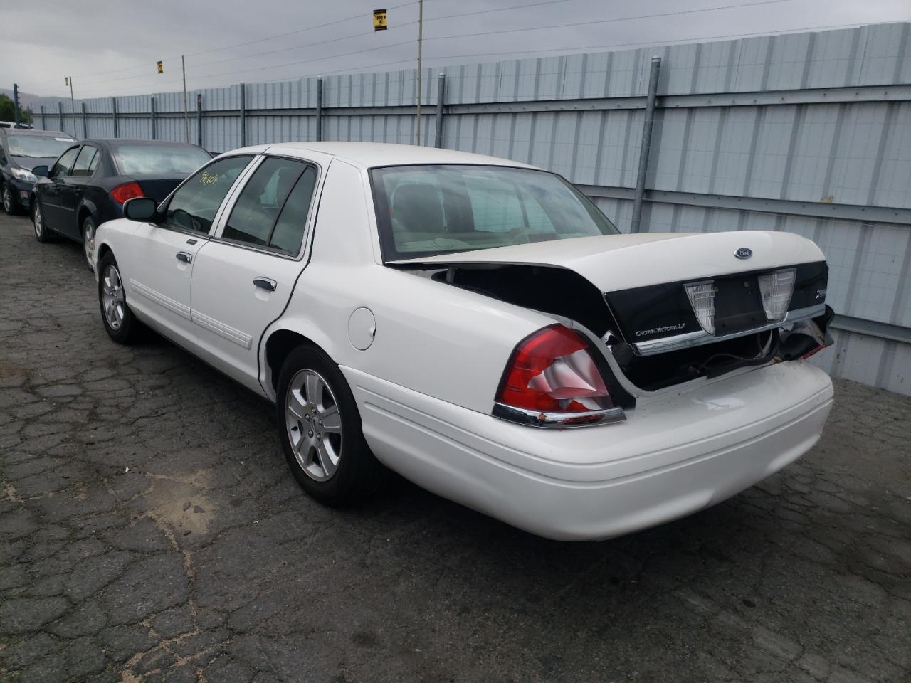 Photo 3 from auction – 2011 FORD CROWN VICT with VIN 2FABP7EV6BX139951