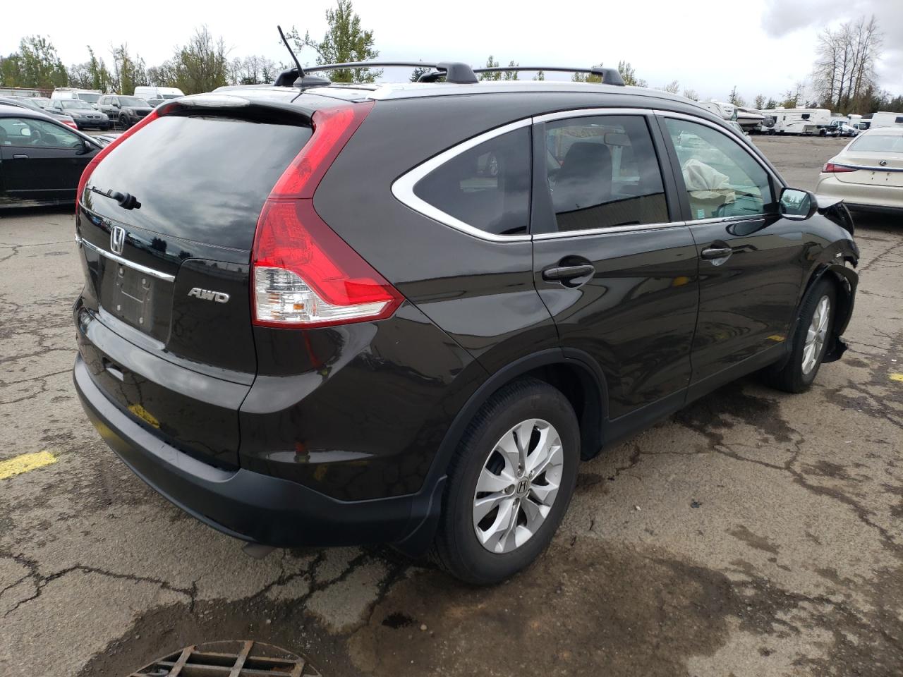 Photo 4 from auction – 2014 HONDA CR-V EXL with VIN 5J6RM4H72EL040164