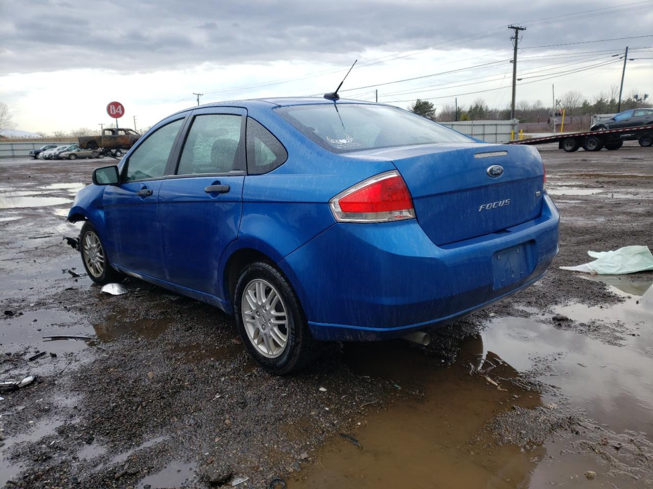Photo 3 from auction – 2011 FORD FOCUS with VIN 1FAHP3FN2BW119435
