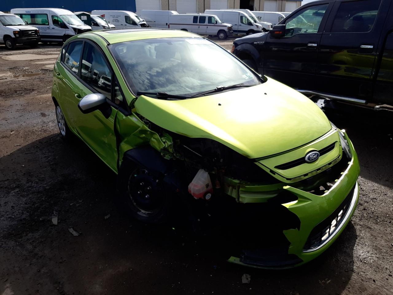 FORD FIESTA SE 2011 with VIN 3FADP4EJ2BM118935 - Photo from auction