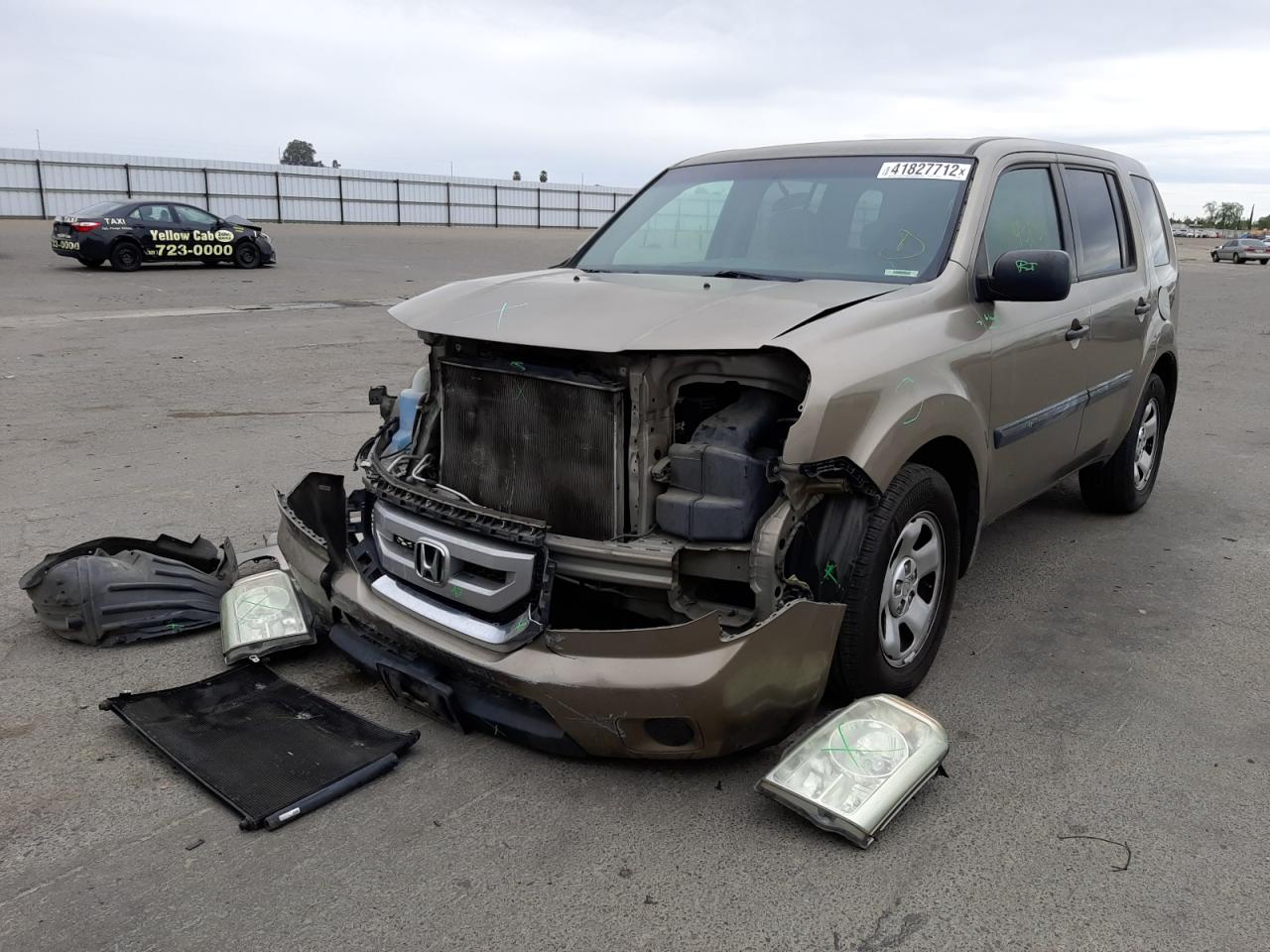 Photo 2 from auction – 2011 HONDA PILOT LX with VIN 5FNYF3H21BB037569