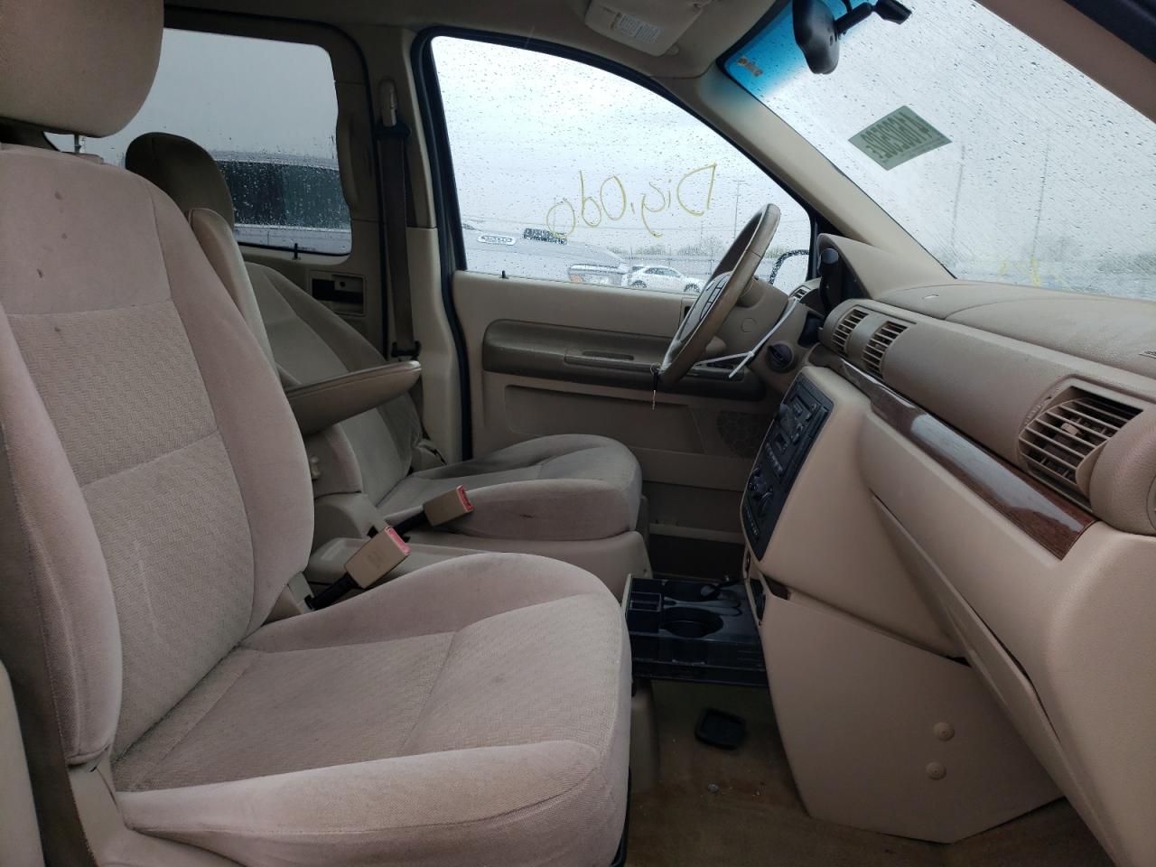 Photo 5 from auction – 2004 FORD FREESTAR S with VIN 2FMZA52214BA65701