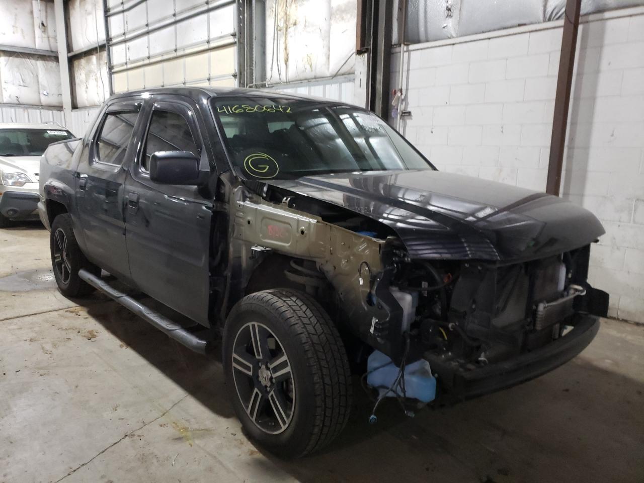 HONDA RIDGELINE 2014 with VIN 5FPYK1F76EB006957 - Photo from auction