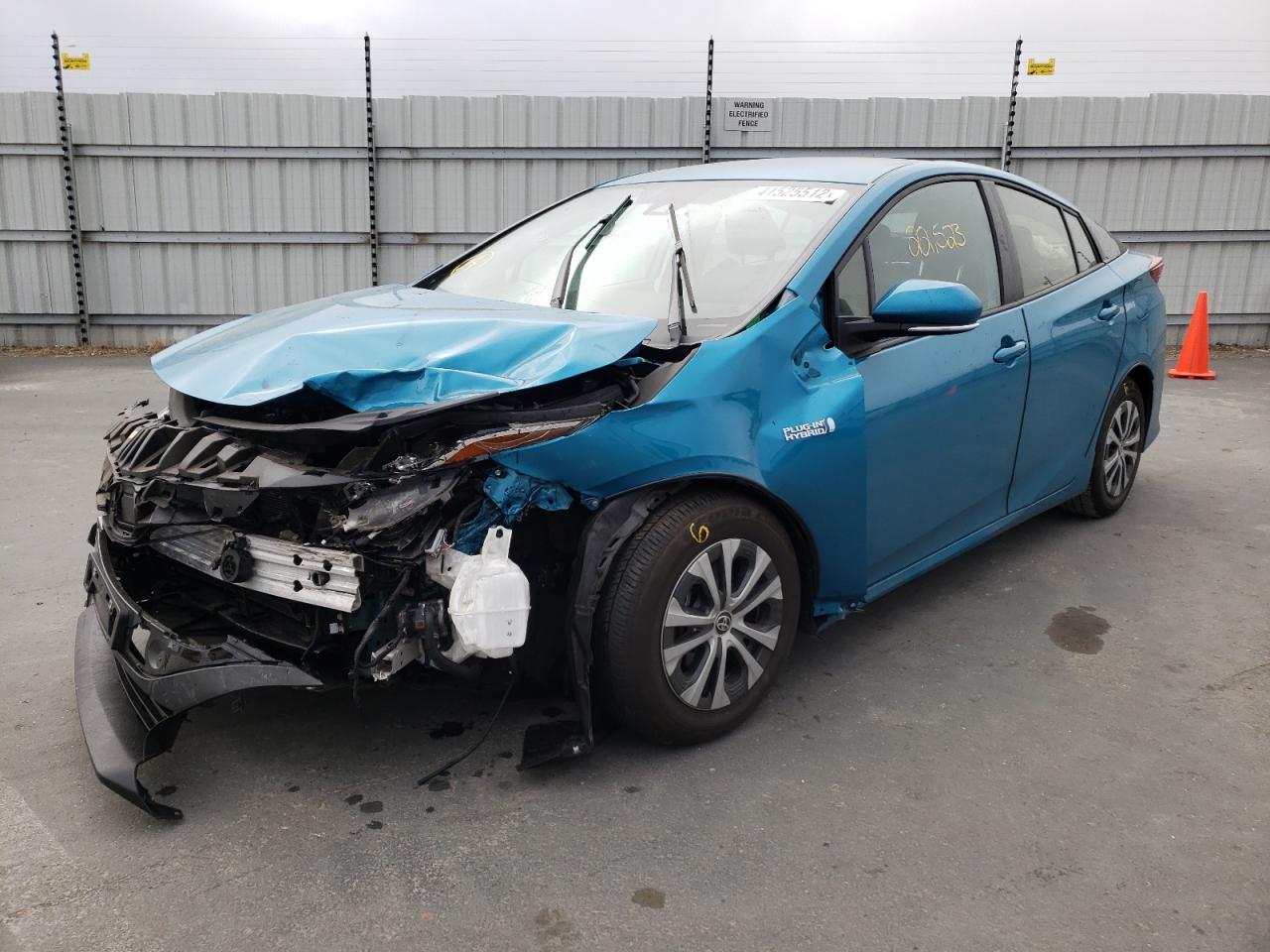 Photo 2 from auction – 2021 TOYOTA PRIUS PRIM with VIN JTDKAMFP5M3186298