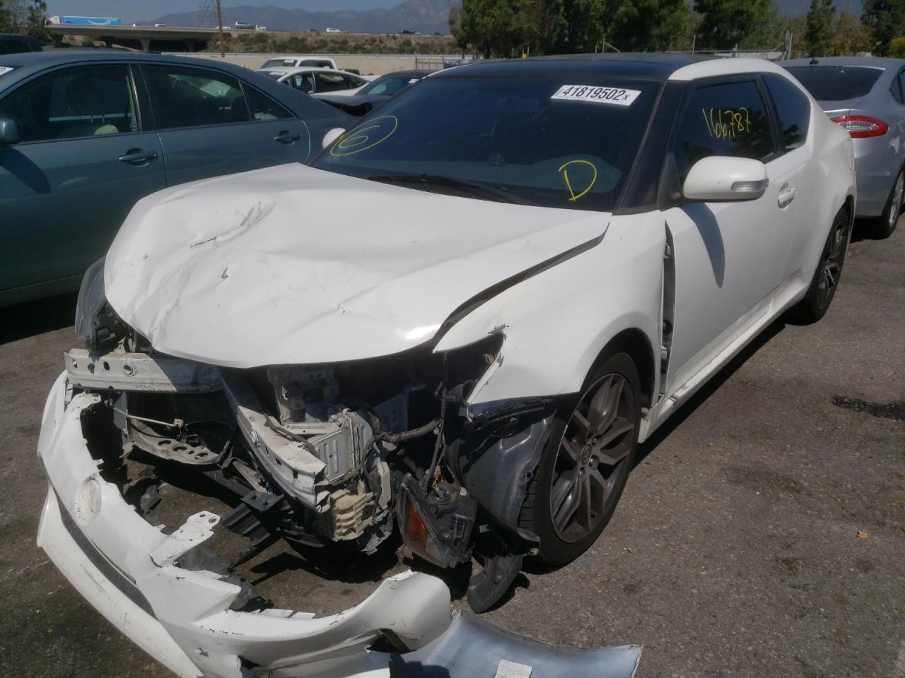 Photo 2 from auction – 2014 TOYOTA SCION TC with VIN JTKJF5C77E3083935