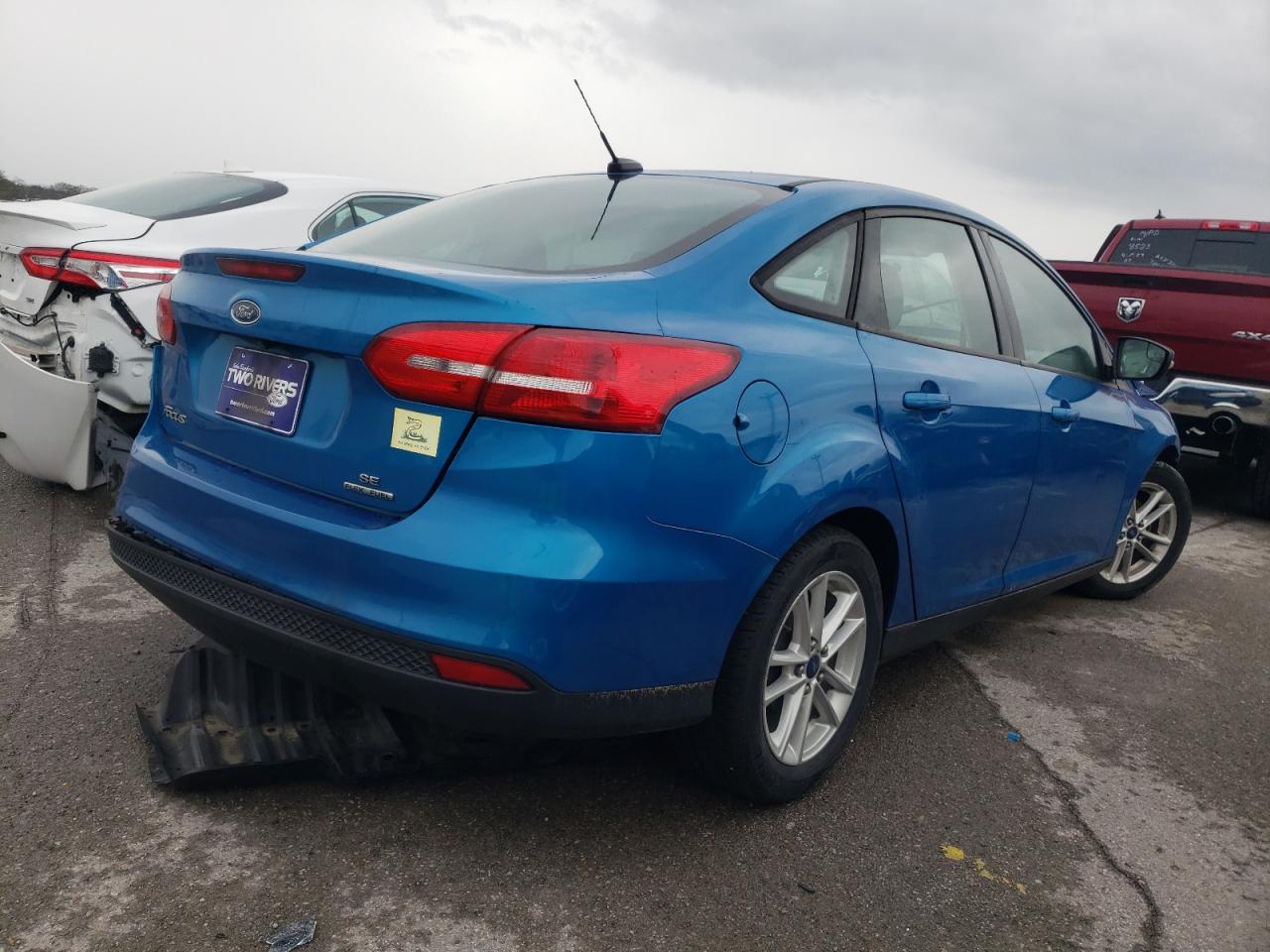 Photo 16 from auction – 2015 FORD FOCUS SE with VIN 1FADP3F28FL318078