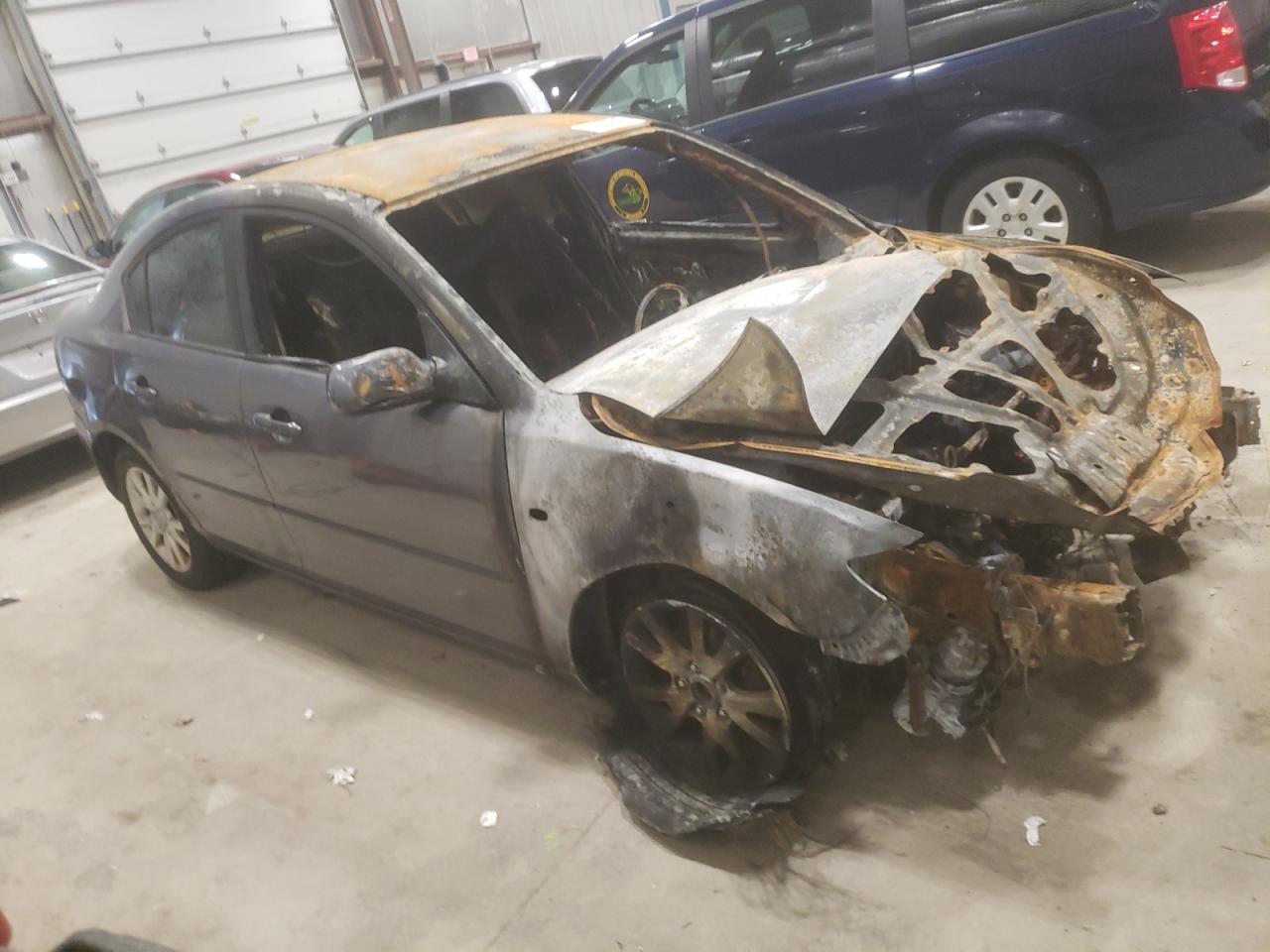 MAZDA 3 I 2007 with VIN JM1BK12F771636641 - Photo from auction
