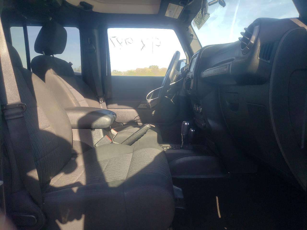 Photo 5 from auction – 2011 JEEP WRANGLER U with VIN 1J4HA3H18BL602333