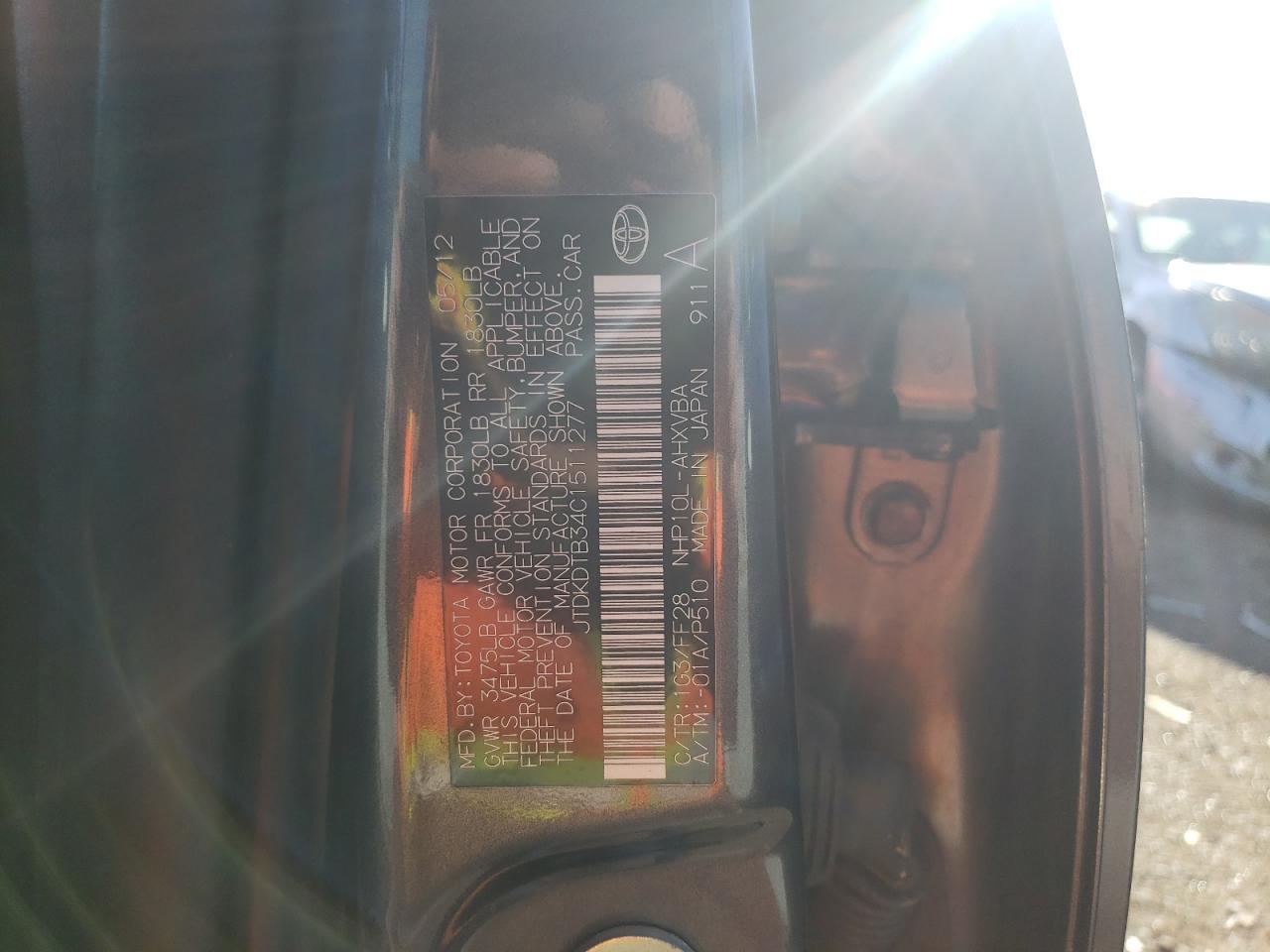 Photo 10 from auction – 2012 TOYOTA PRIUS C with VIN JTDKDTB34C1511277