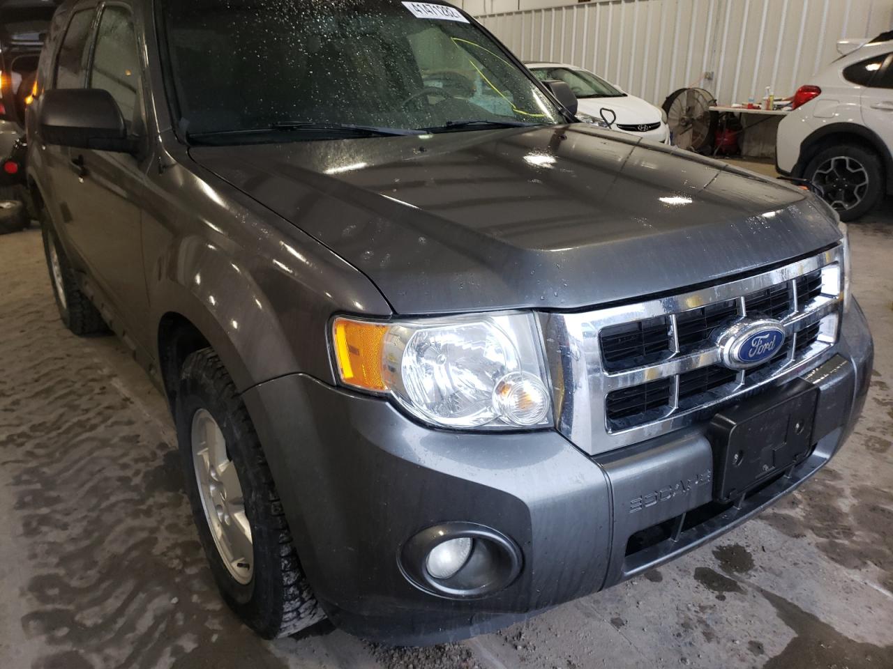Photo 10 from auction – 2011 FORD ESCAPE XLT with VIN 1FMCU0D7XBKA97736