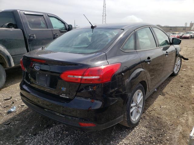 Photo 4 from auction – 2016 FORD FOCUS SE with VIN 1FADP3F20GL379460