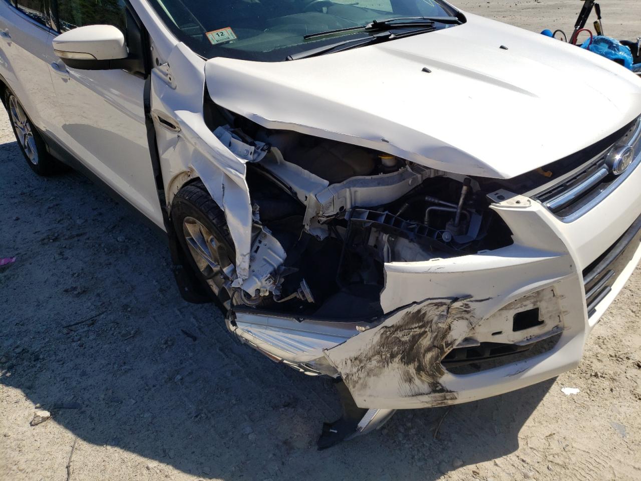 Photo 9 from auction – 2013 FORD ESCAPE SEL with VIN 1FMCU9H90DUB34946