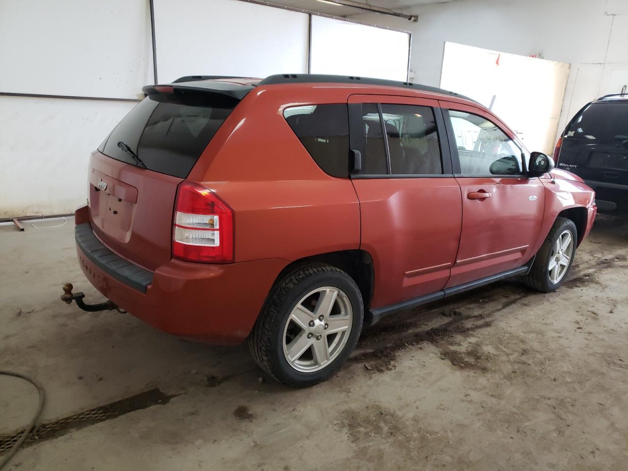 Photo 4 from auction – 2010 JEEP COMPASS SP with VIN 1J4NF4FB9AD630995