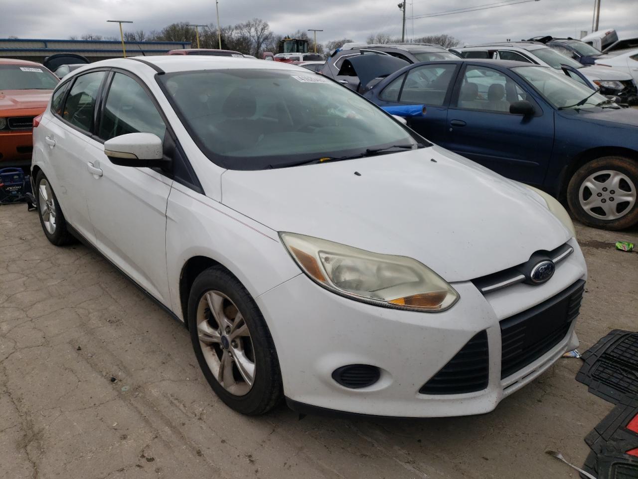 FORD FOCUS SE 2014 with VIN 1FADP3K2XEL119490 - Photo from auction
