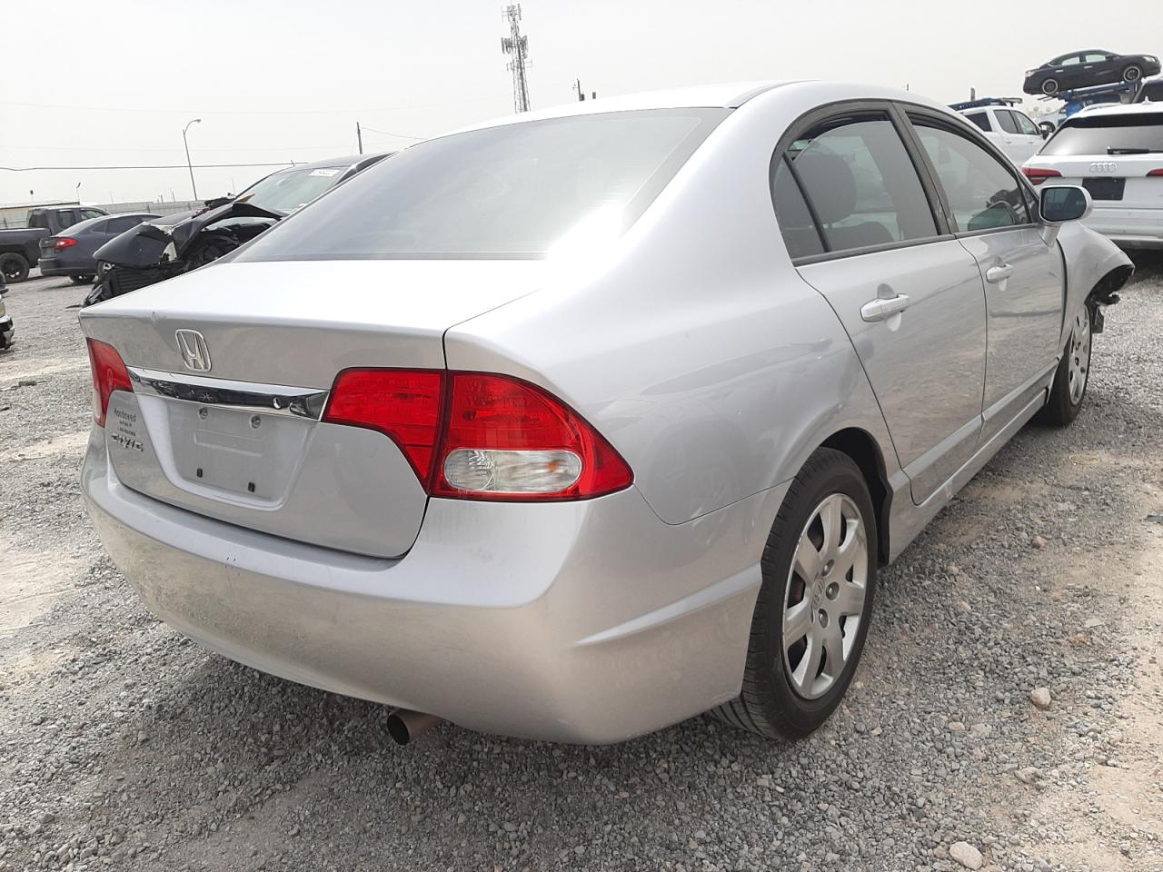 Photo 4 from auction – 2010 HONDA CIVIC LX with VIN 19XFA1F53AE032403