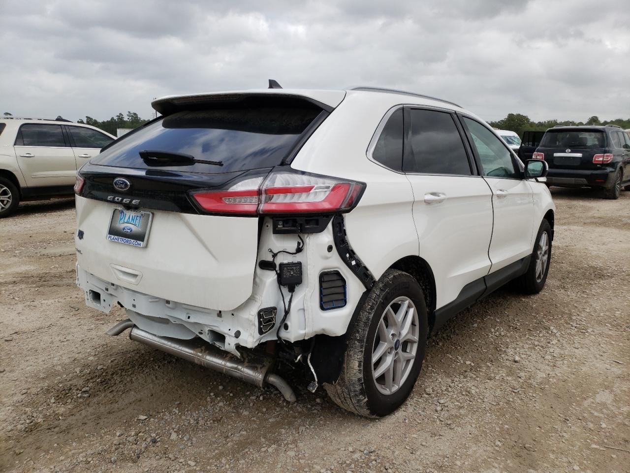 Photo 4 from auction – 2021 FORD EDGE SEL with VIN 2FMPK3J90MBA46905