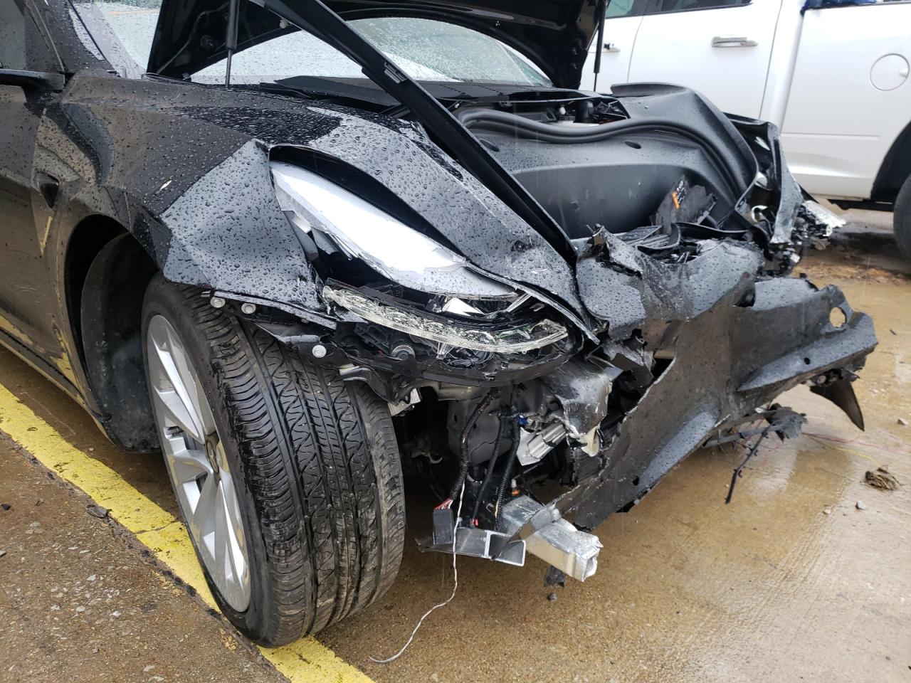 Photo 9 from auction – 2021 TESLA MODEL 3 with VIN 5YJ3E1EA0MF019242