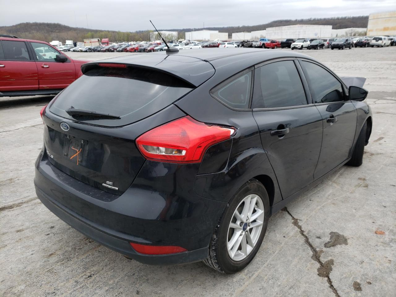 Photo 4 from auction – 2016 FORD FOCUS SE with VIN 1FADP3K29GL268573