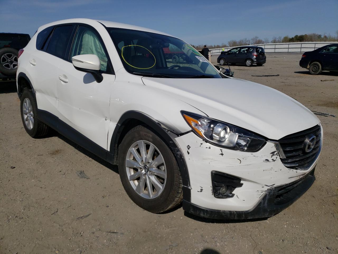 MAZDA CX-5 TOURI 2016 with VIN JM3KE2CYXG0743256 - Photo from auction