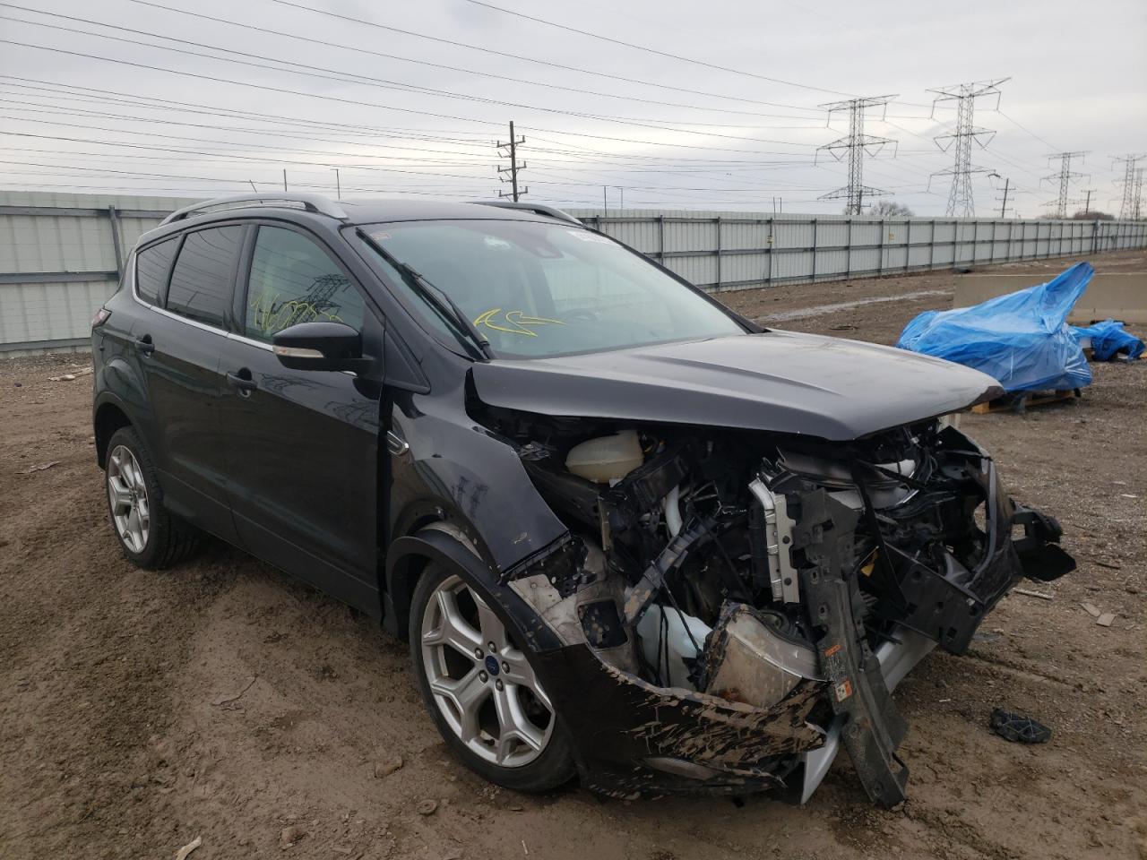 FORD ESCAPE TIT 2017 with VIN 1FMCU9J94HUC20504 - Photo from auction