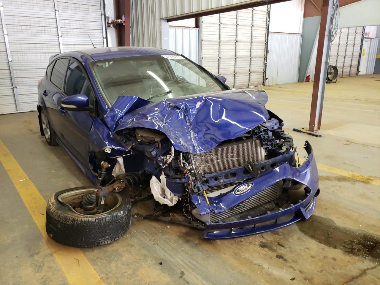FORD FOCUS ST 2014 with VIN 1FADP3L97EL310800 - Photo from auction