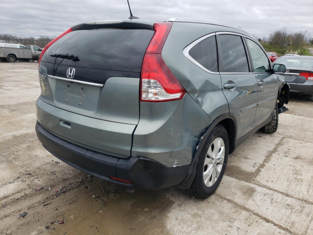 Photo 4 from auction – 2012 HONDA CR-V EXL with VIN JHLRM3H71CC002585