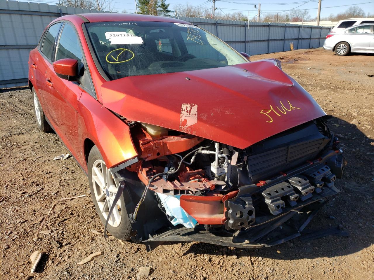 FORD FOCUS SE 2018 with VIN 1FADP3F21JL254975 - Photo from auction