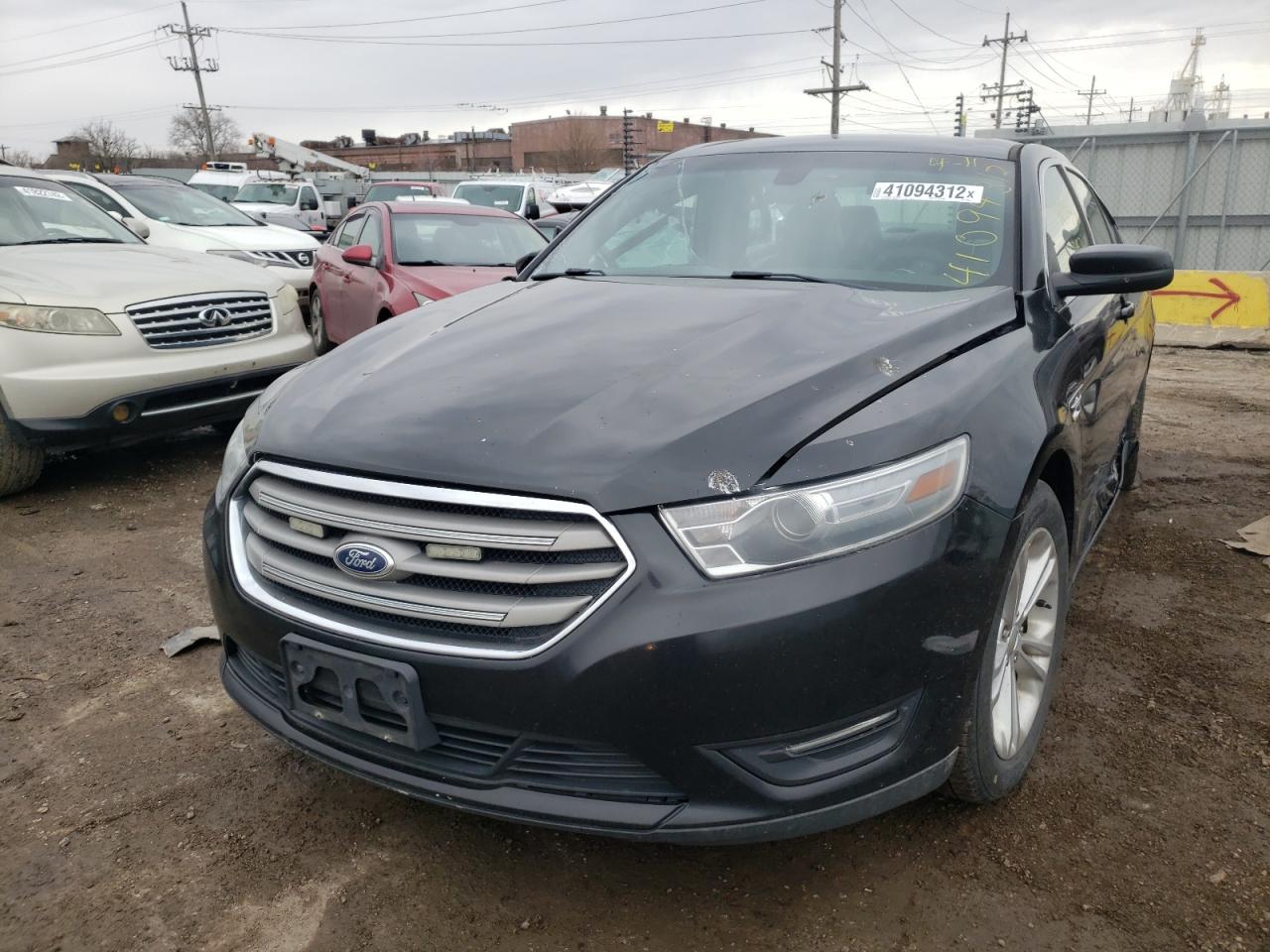 Photo 2 from auction – 2014 FORD TAURUS SEL with VIN 1FAHP2H81EG139854
