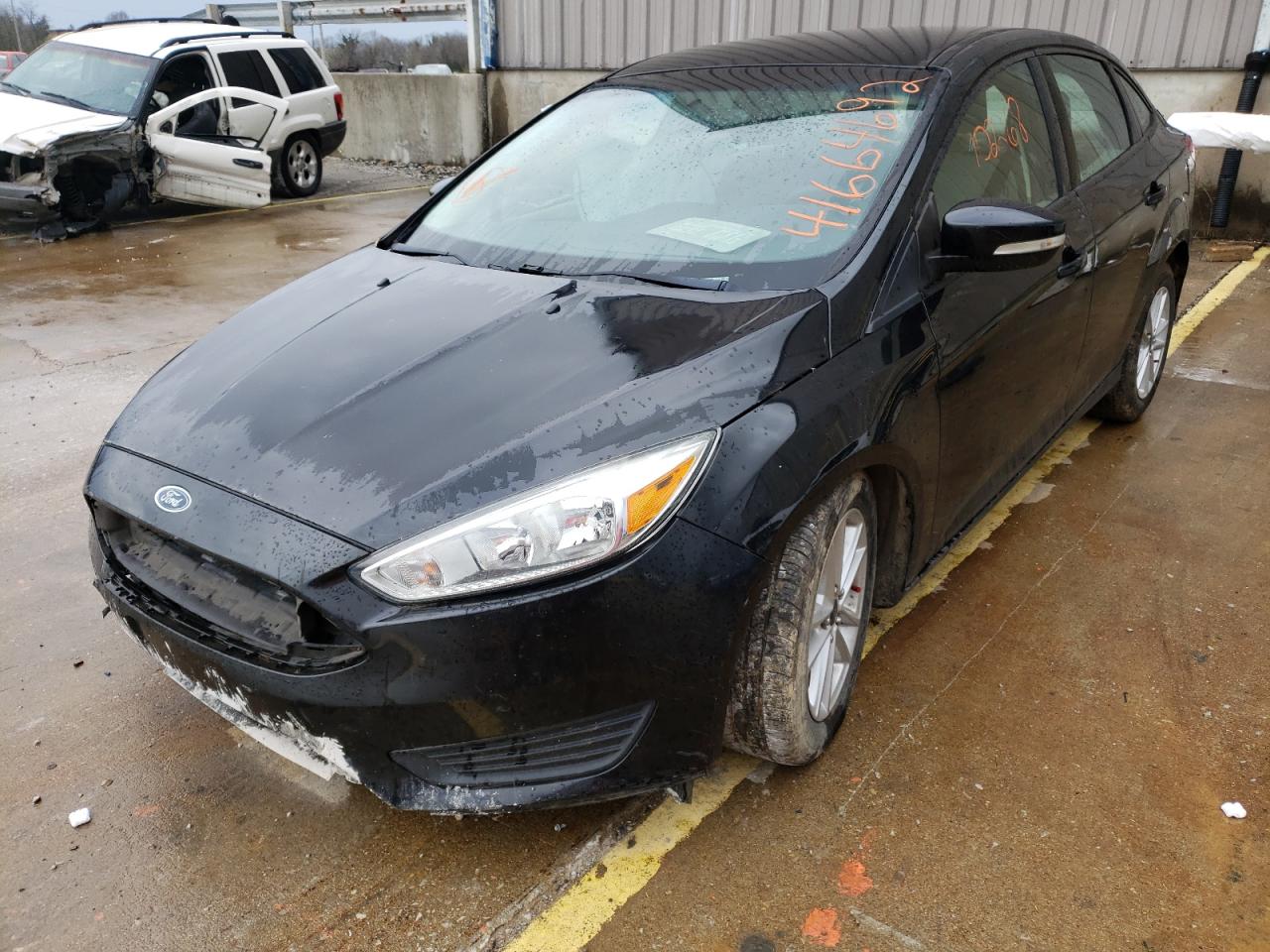 Photo 2 from auction – 2015 FORD FOCUS SE with VIN 1FADP3F22FL259433