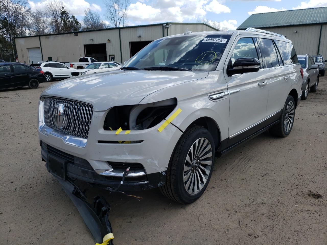Photo 2 from auction – 2021 LINCOLN NAVIGATOR with VIN 5LMJJ2LT7MEL06830