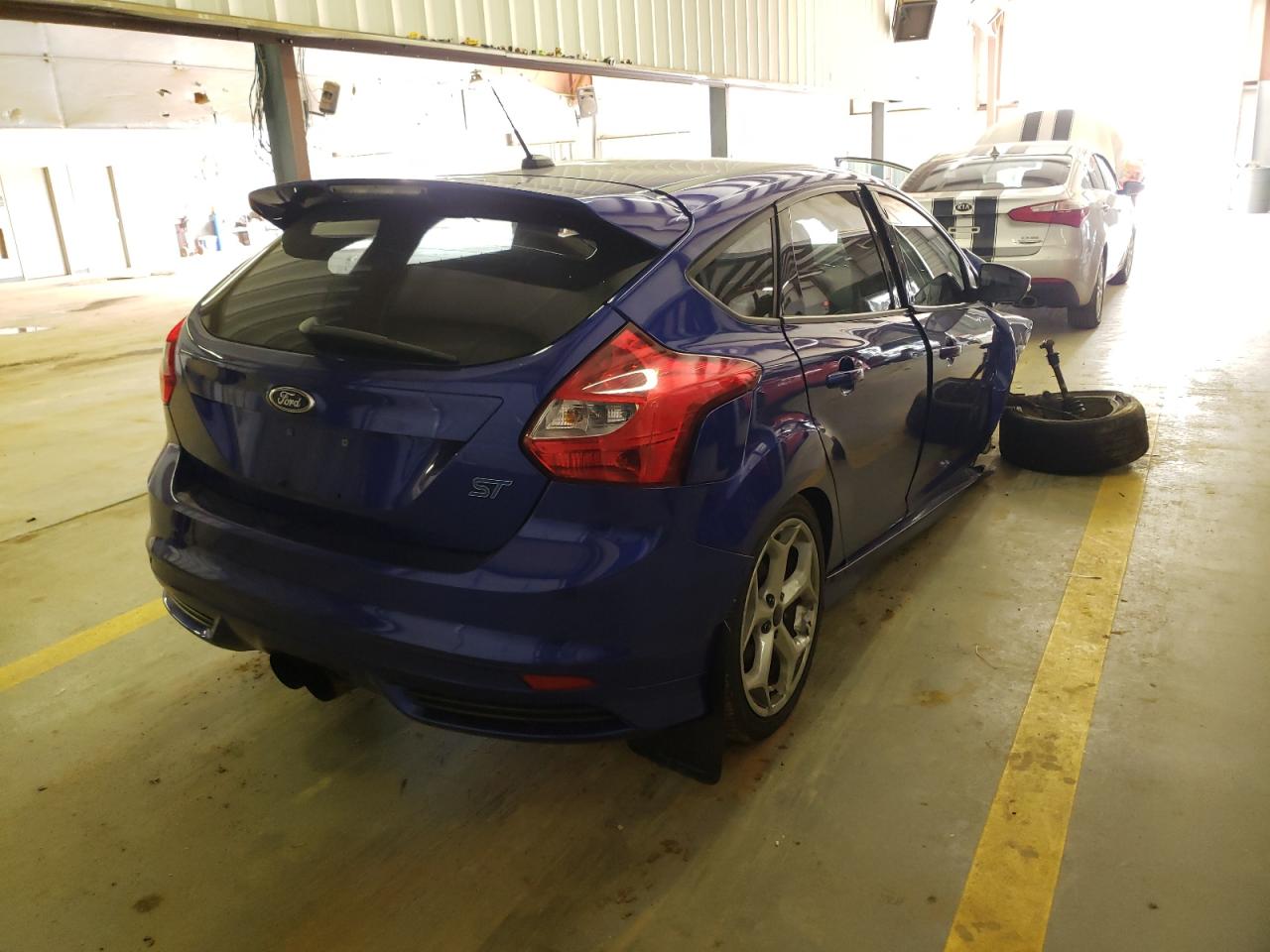 Photo 4 from auction – 2014 FORD FOCUS ST with VIN 1FADP3L97EL310800