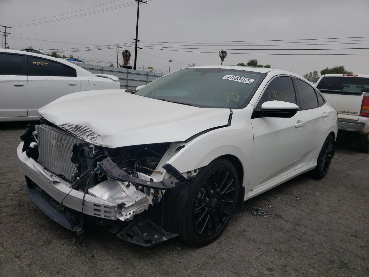 Photo 2 from auction – 2016 HONDA CIVIC EX with VIN 2HGFC1F33GH642163