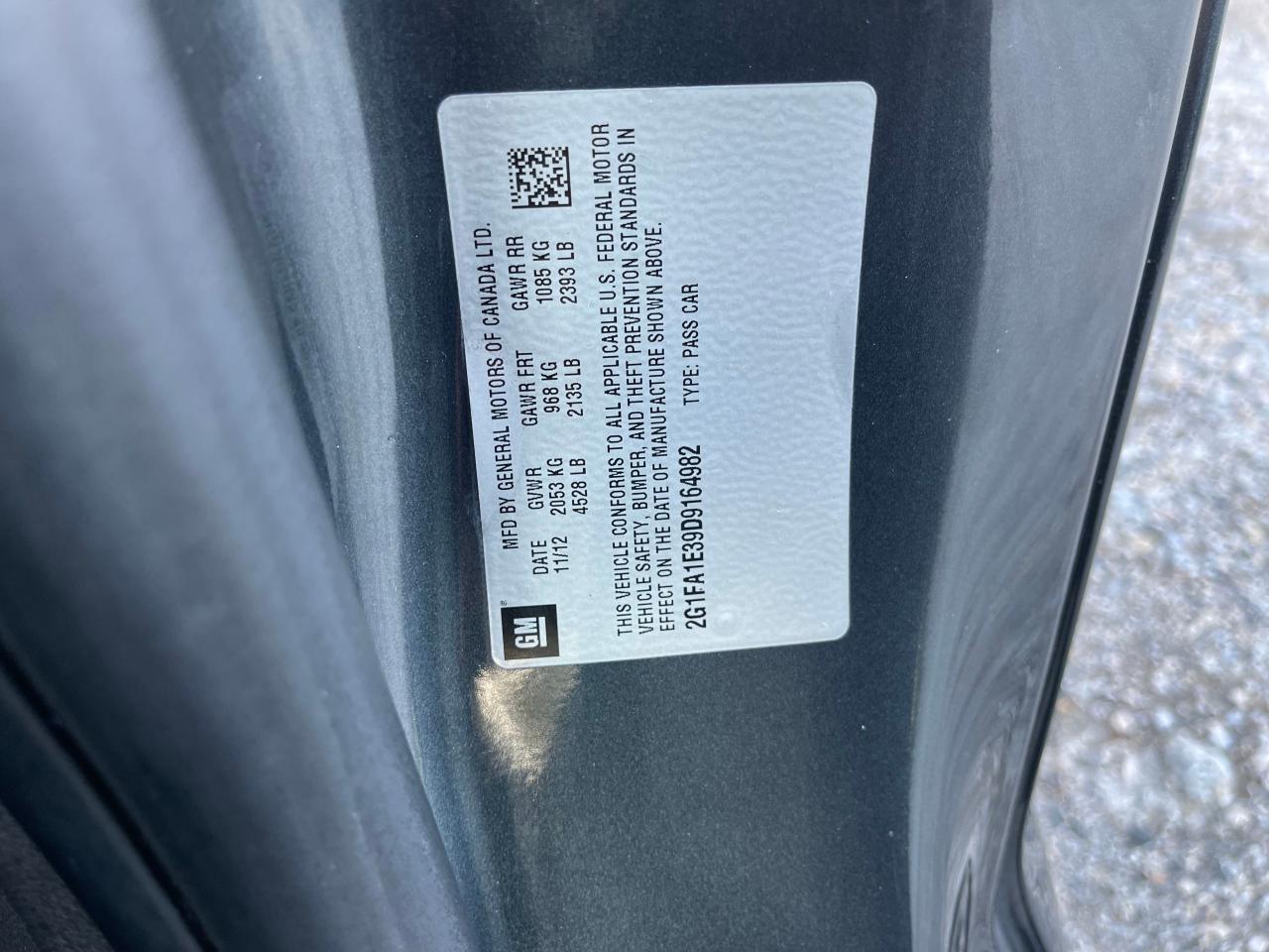 Photo 10 from auction – 2013 CHEVROLET CAMARO LS with VIN 2G1FA1E39D9164982