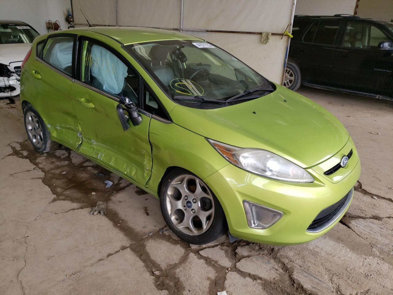 FORD FIESTA SES 2011 with VIN 3FADP4FJ9BM127436 - Photo from auction