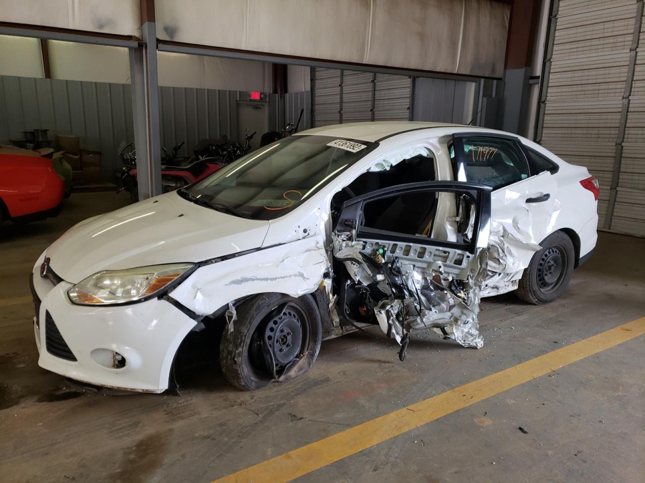 Photo 9 from auction – 2014 FORD FOCUS S with VIN 1FADP3E28EL306755