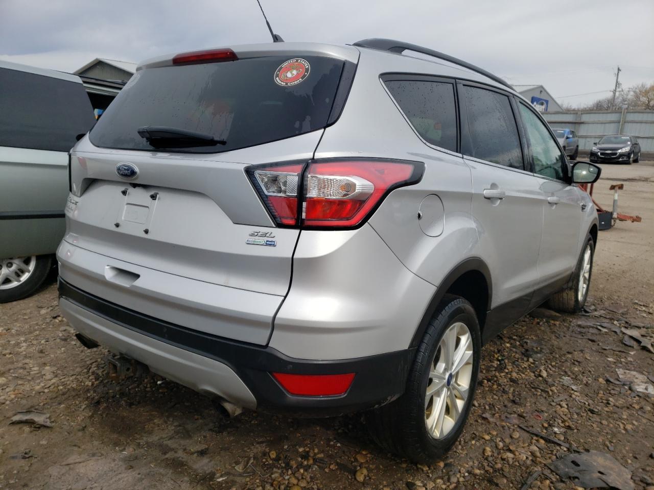 Photo 4 from auction – 2018 FORD ESCAPE SEL with VIN 1FMCU9HD5JUC35559