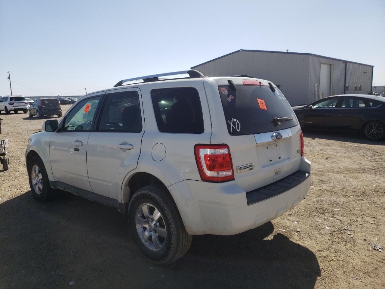Photo 3 from auction – 2010 FORD ESCAPE LIM with VIN 1FMCU0EG2AKD20588