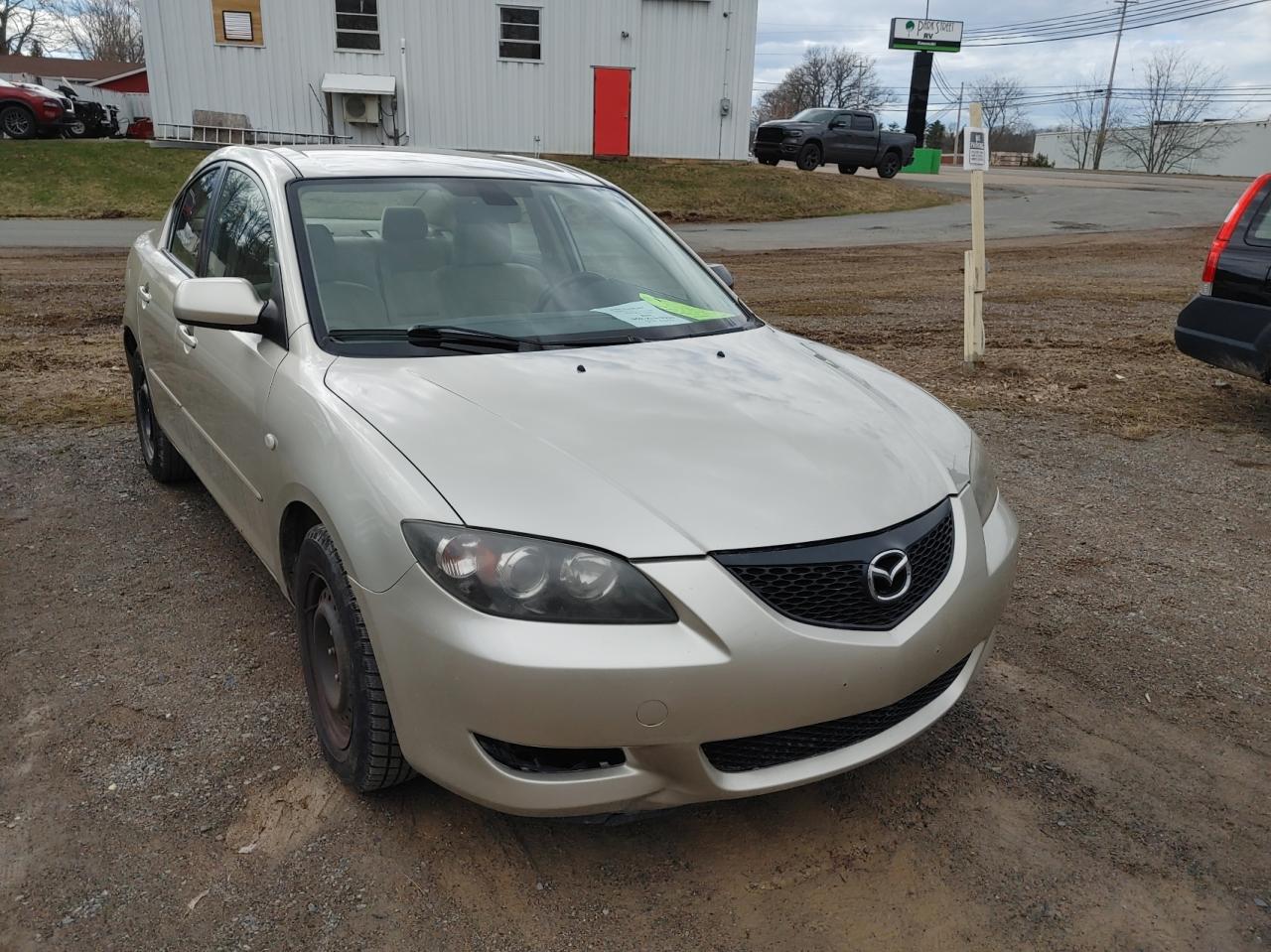 MAZDA 3 I 2004 with VIN JM1BK12F341166345 - Photo from auction